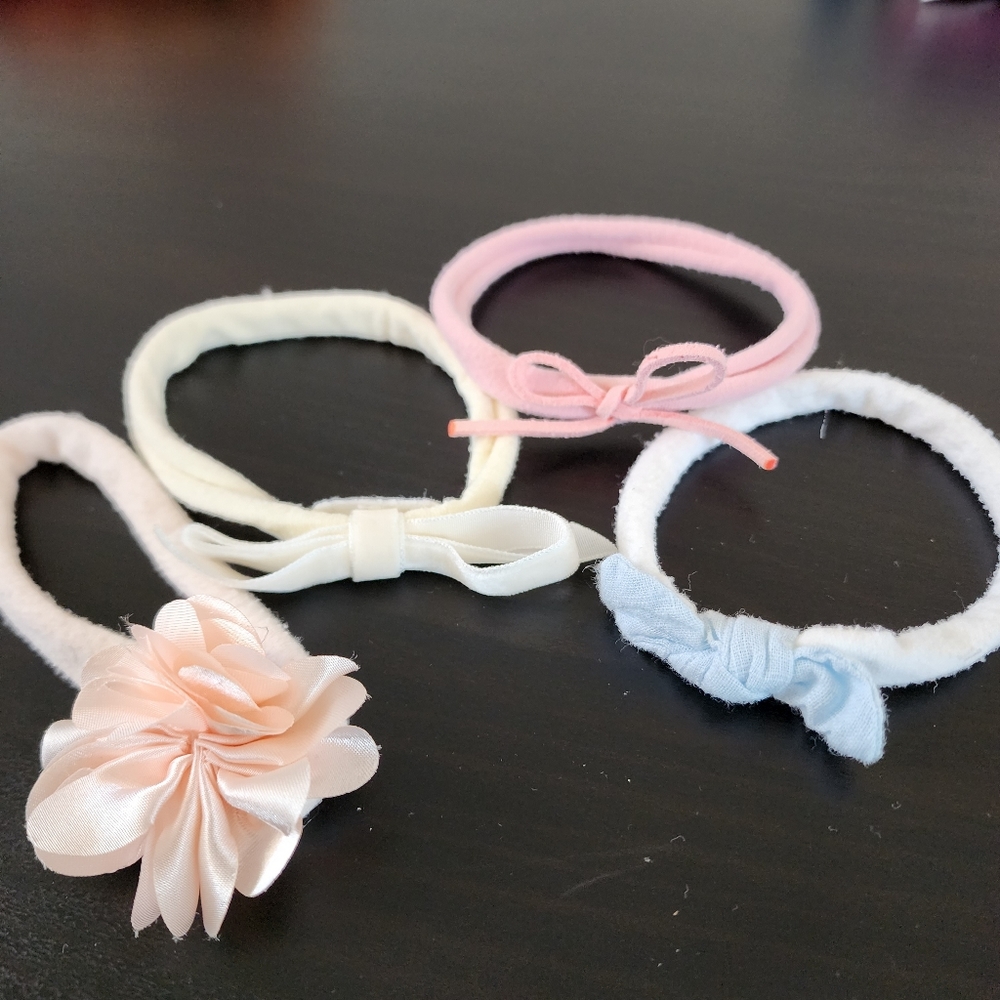 3/$12 ● 4 headbands 0-12m
